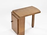 an image of a small wooden table with a drawer on it