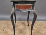 an image of a small table with a drawer on top of it