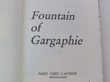a book with a picture of a fountain of garbage on it