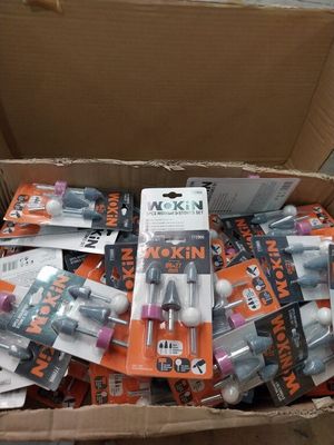 a cardboard box full of toothbrushes and toothpaste