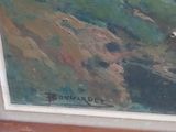 a picture of a painting on the window sill of a house