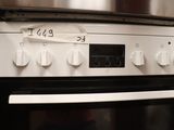 a close up of a white oven with a price tag on it