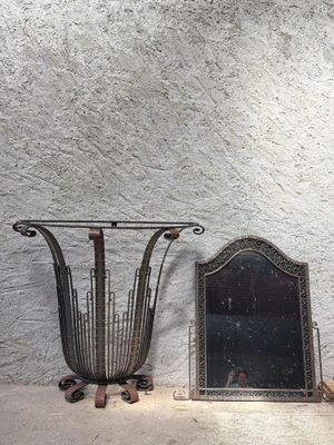 a mirror and a mirror on a table next to a wall