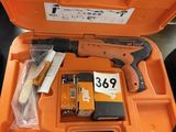 an orange tool box with tools in it sitting on top of a table