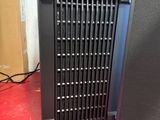 a black computer tower sitting on a red table