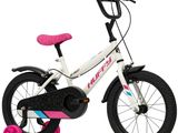 a close up of a child ' s bike with a pink handlebar