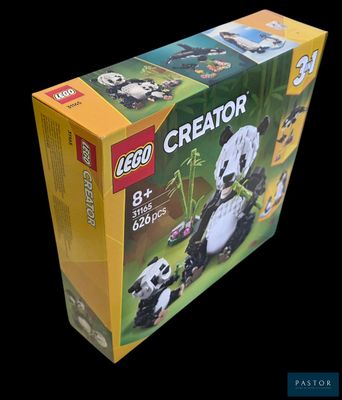 une boîte de Lego Creator « Pandas » posée sur une surface noire