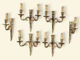 six bougies disposées en cercle sur le mur