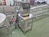 a machine that is sitting on a table in a factory