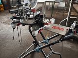a man that is working on a machine in a building