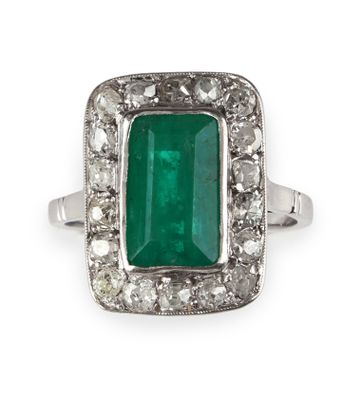 an emerald and diamond ring