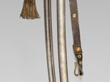 a very long knife with a long blade on it