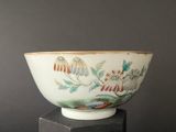 a close up of a bowl on a pedestal with a black background