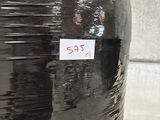 a large black container with a sticker on it