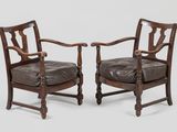 pair of early 20th century mahogany armchairs with leather upholstered seats