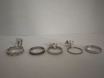 a lot of different rings that are on the table
