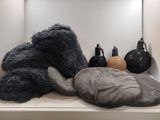 a stuffed animal that is sitting on a shelf