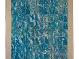 an image of a blue and green painting on a piece of paper