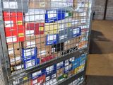 a large metal cart with many boxes on top of it