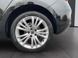 a close up view of a car ' s wheel and tire