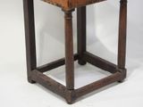 a small table with a wooden top on a white background