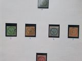 a picture of a wall with a bunch of stamps on it