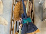 an overhead view of a broom and a broom on a wooden chair