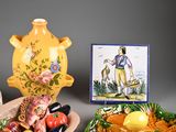 a bowl of fruit and a bowl of vegetables on a table