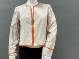 an image of a mannequin mannequin wearing a white jacket and black pants