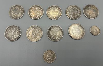 une collection de pièces britanniques comprenant un penny, un penny, un penny et un penny