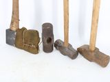 five different types of hammers that are on a white surface