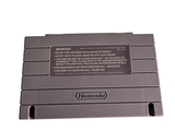 a nintendo game console sitting on top of a white table