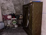 an image of a room with a refrigerator in it