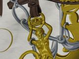 a close up of a painting of a man holding a cross