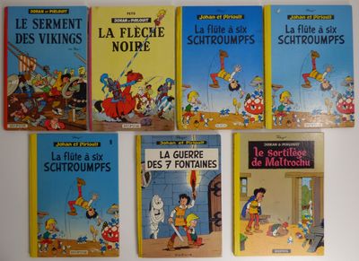 plusieurs livres pour enfants sont alignés sur une surface blanche