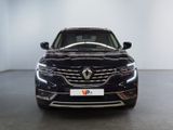 the front view of a black car in a white room