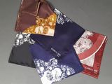 several different types of handkerchiefs laid out on a table