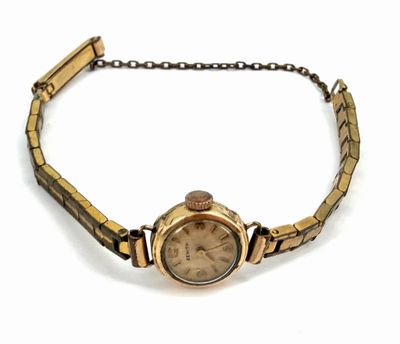 an image of a wrist watch on a chain on a white background