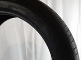 a close up of a tire tire on a white surface