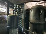 two tanks that are sitting next to each other on a shelf