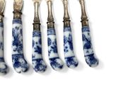 six pieces of blue and white chinaware with silver handles and spoons