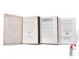an old book opened on a white background with a red and black title