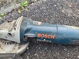 a small electric tool that is laying on the ground