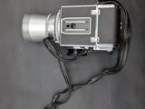 a camera that is sitting on a black surface