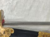 a sword that is laying on a table