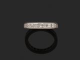 an art deco diamond half - eternity ring
