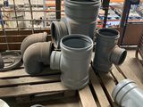many different types of pipes and pipes on a pallet