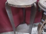 two stools that are next to each other on the floor