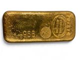 a gold bar on a white background