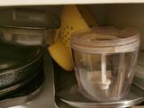 a blender with a banana in it sitting on a counter